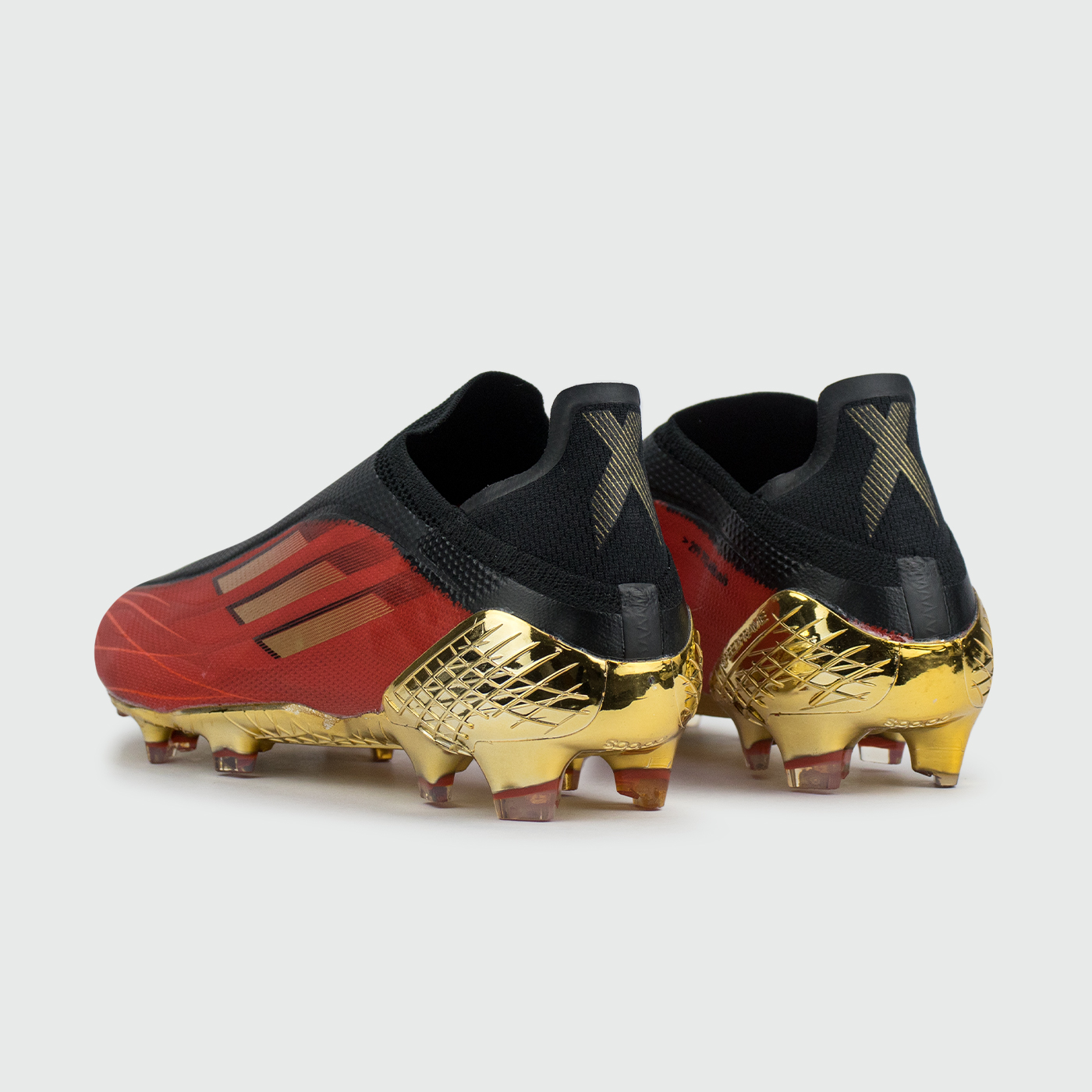 Бутсы Adidas X SPEEDFLOW+ FG Red Black / Gold Бутсы Adidas X SPEEDFLOW+ FG Red Black / Gold